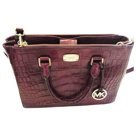 burgundy michael kors wallet small|burgundy Michael Kors bag.